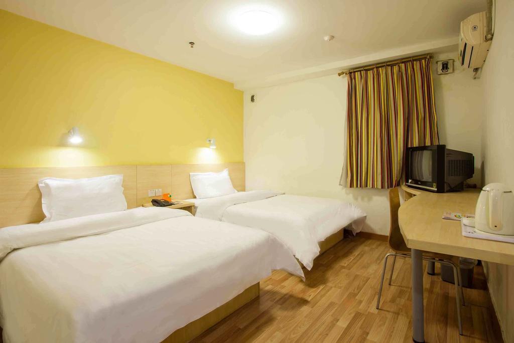 7Days Inn Guangzhou Gangding Longkou XI Road Rum bild
